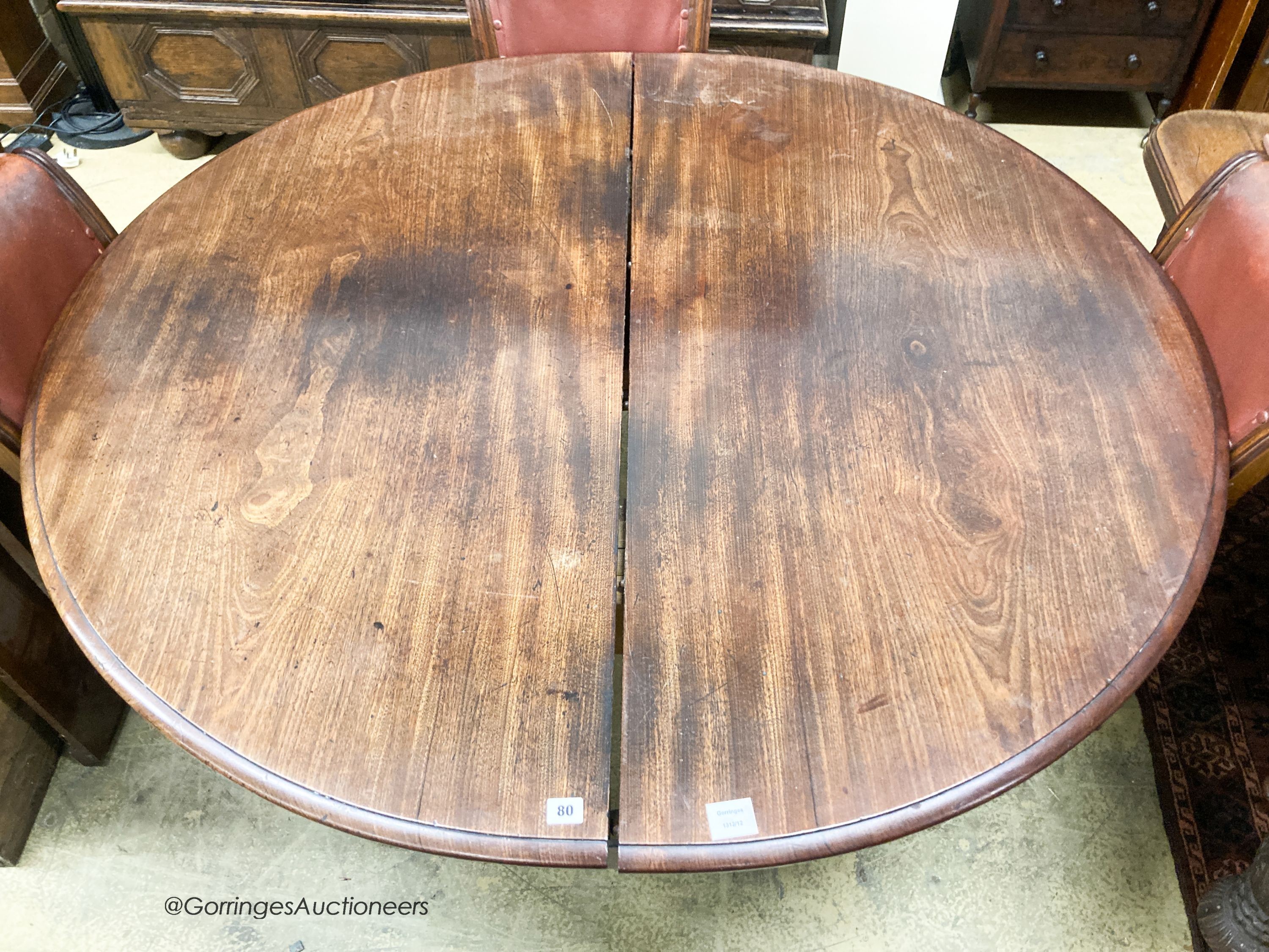 A Victorian mahogany circular extending dining table, (no leaves) length 140cm, depth 135cm, height 75cm
